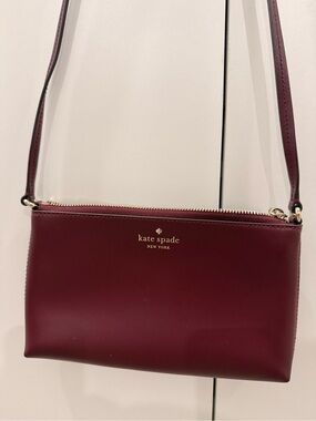 kate spade burgundy leather crossbody with gold hardware